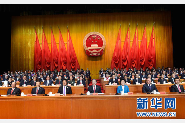 10月1日，慶祝中華人民共和國成立66周年暨新疆維吾爾自治區(qū)成立60周年大會在新疆人民會堂隆重舉行。 新華社記者 饒愛民 攝