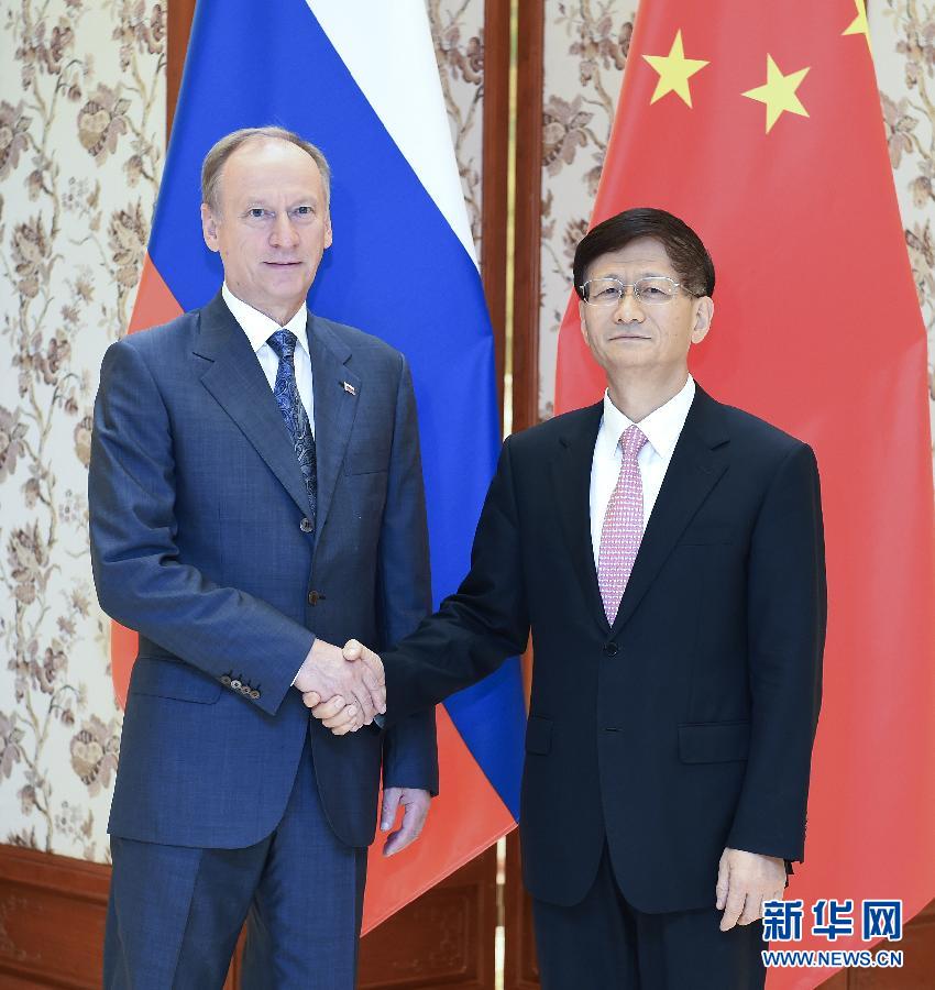 9月13日，中共中央政治局委員、中央政法委書記孟建柱在北京同俄羅斯聯(lián)邦安全會議秘書帕特魯舍夫共同主持中俄執(zhí)法安全合作機制第三次會議。新華社記者張領攝