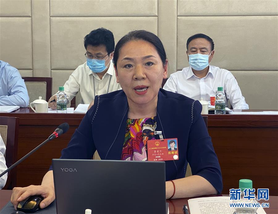 （兩會(huì)&middot;熱點(diǎn)畫(huà)報(bào)）（3）代表委員聚焦民法典草案