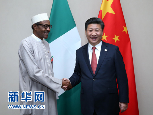 12月4日，國(guó)家主席習(xí)近平在約翰內(nèi)斯堡會(huì)見(jiàn)尼日利亞總統(tǒng)布哈里。 新華社記者 龐興雷 攝 