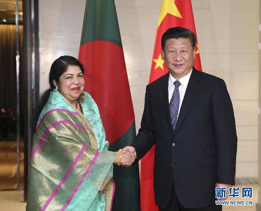 10月14日，國(guó)家主席習(xí)近平在達(dá)卡會(huì)見孟加拉國(guó)國(guó)民議會(huì)議長(zhǎng)喬杜里。 新華社記者蘭紅光攝 