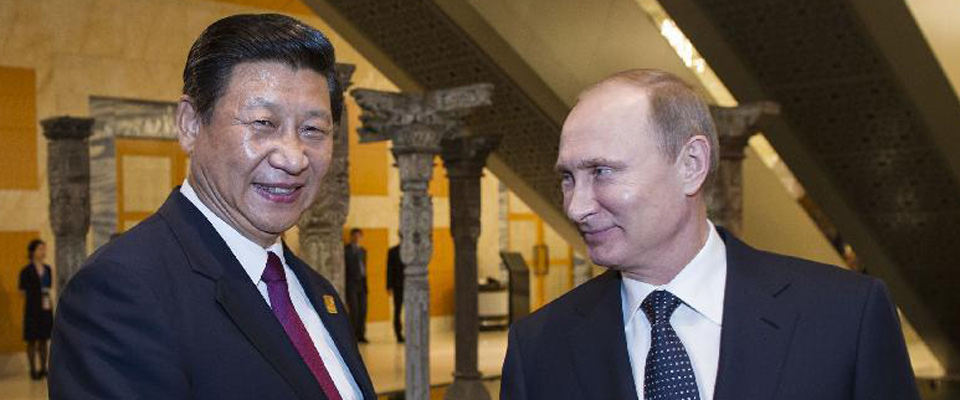 2013年10月，習(xí)近平在印尼巴厘島會見普京